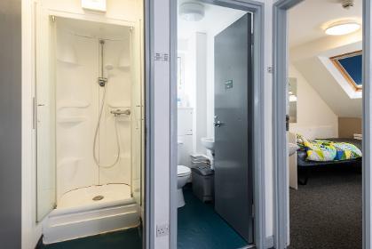 A band 1 shared bathroom bedroom in Halifax college. Example room layout. Actual layout and furnishings may vary. 